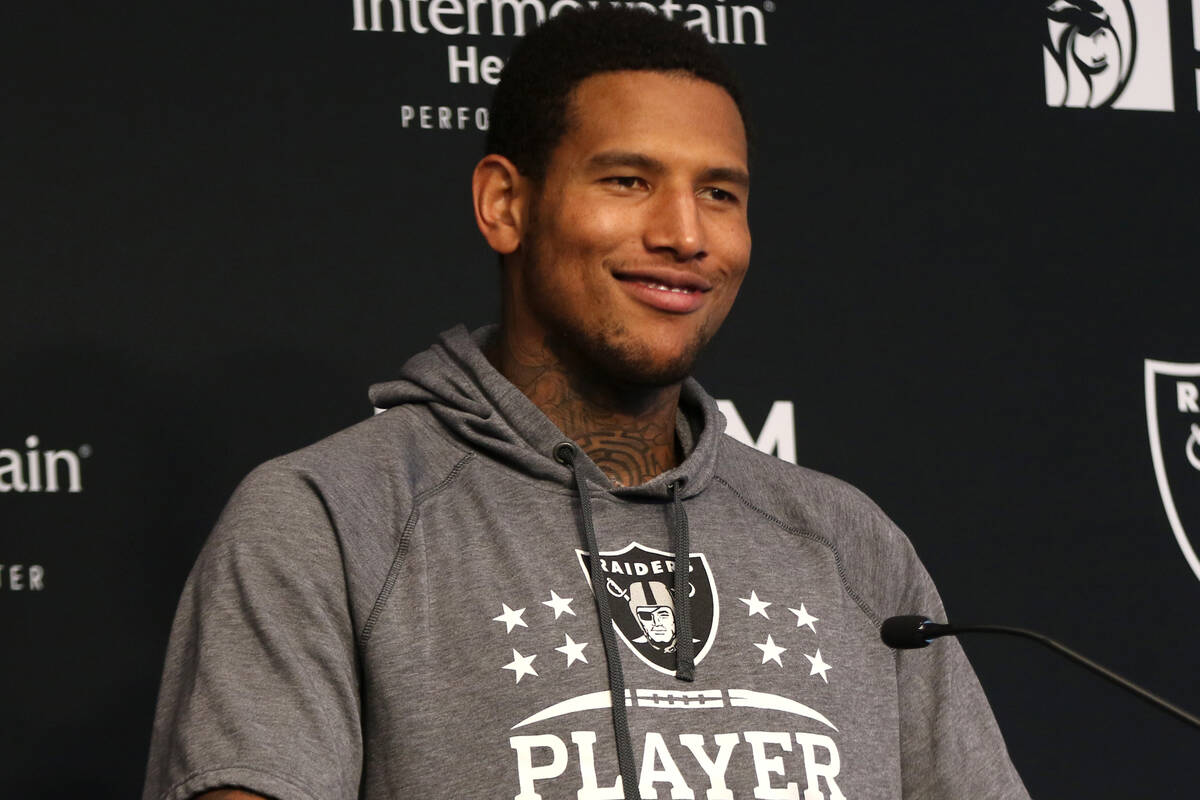 Raiders tight end Darren Waller gestures during a news conference at the Raiders Headquarters a ...