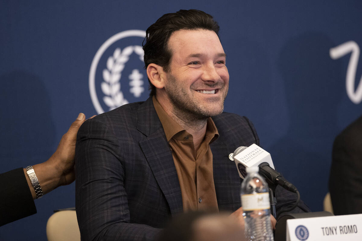 Former football player Tony Romo speaks during the College Football Hall of Fame introduction c ...