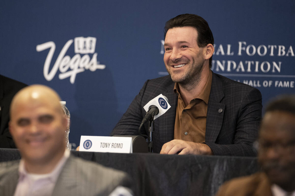Former football player Tony Romo speaks during the College Football Hall of Fame introduction c ...