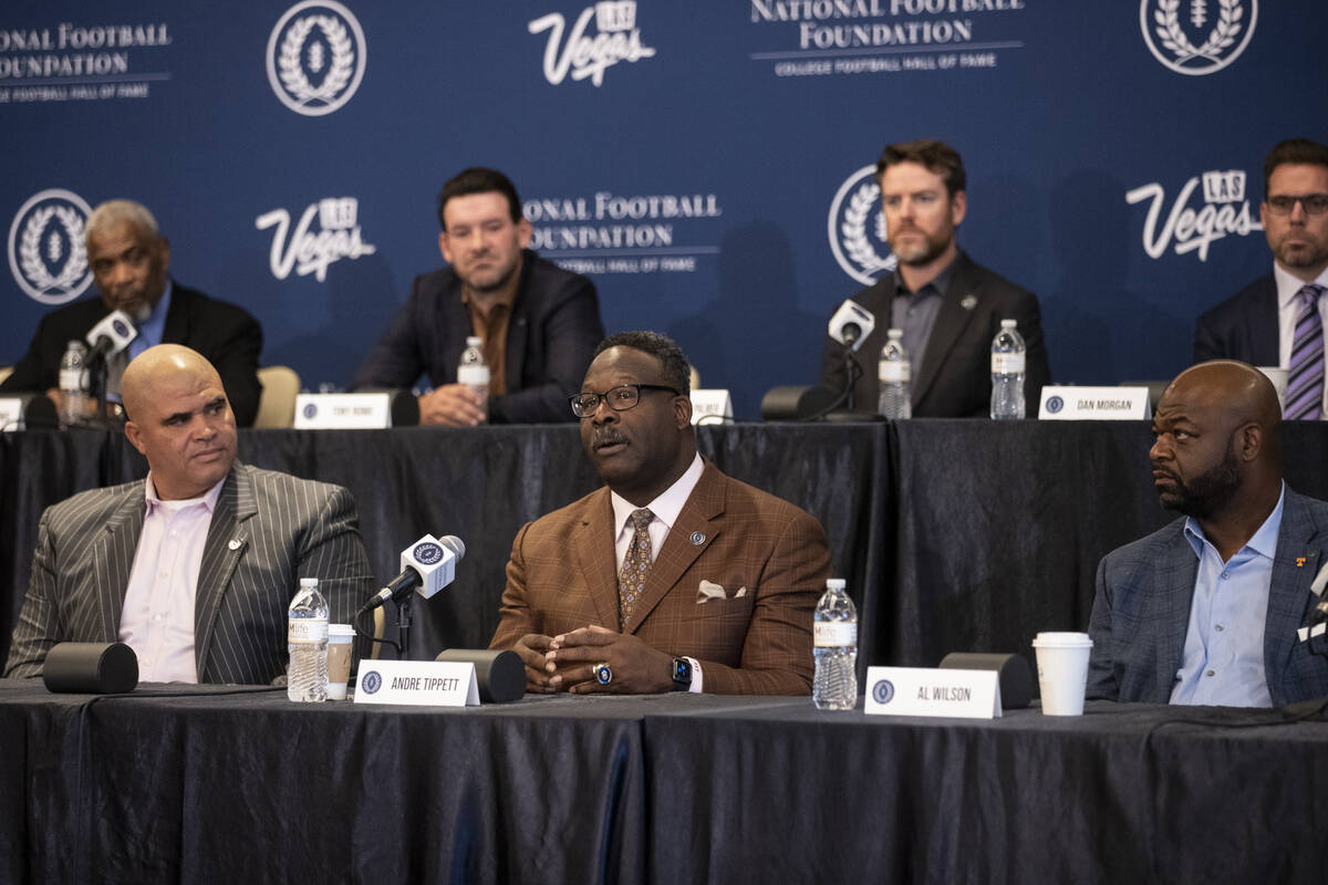 Inductee Andre Tippett, center, speaks during the College Football Hall of Fame introduction ce ...