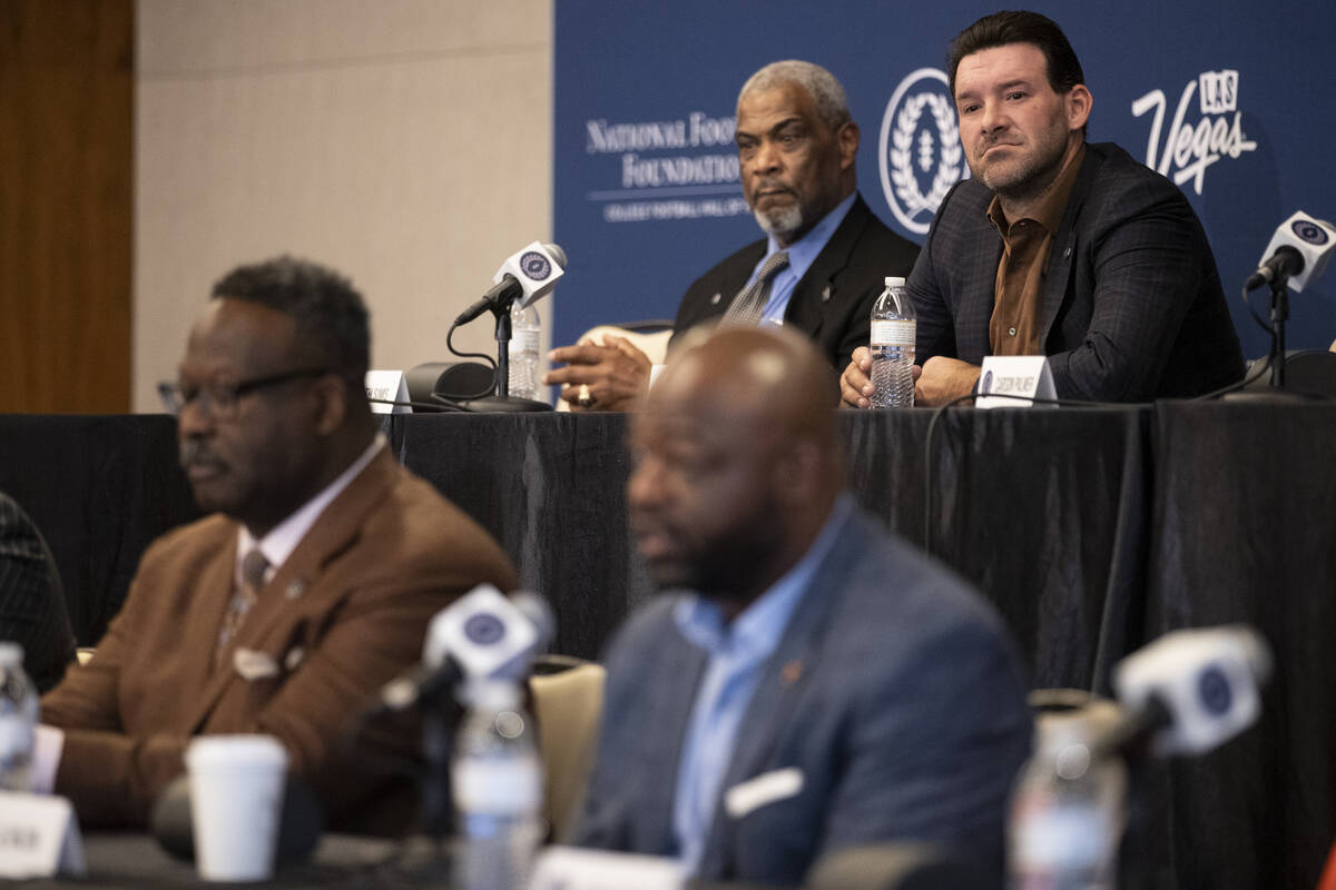 Inductees Kenneth Sims, left, and Tony Romo, participate during the College Football Hall of Fa ...