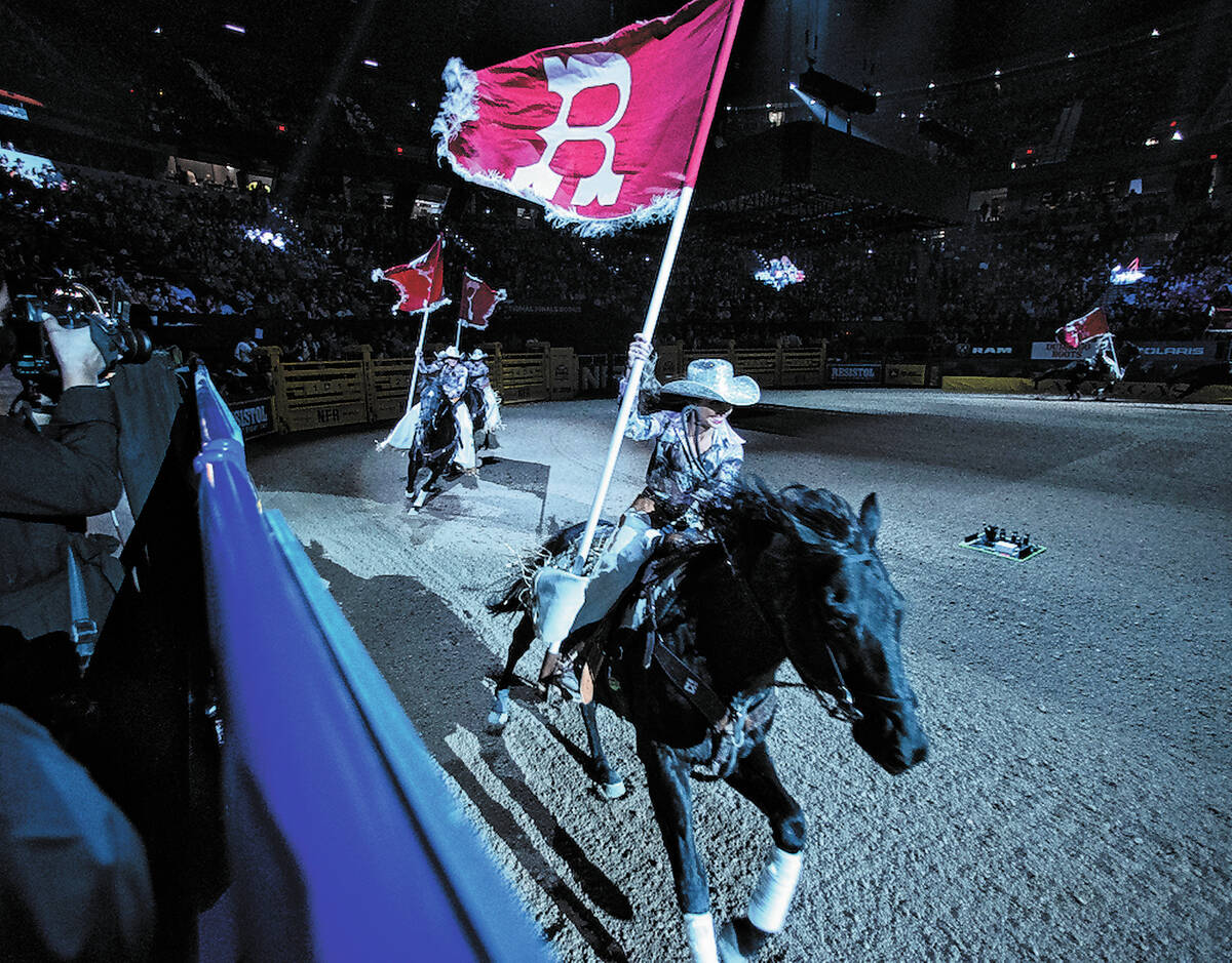 Flag girls ride their horses at the opening ceremony during the sixth round of the Wrangler Nat ...