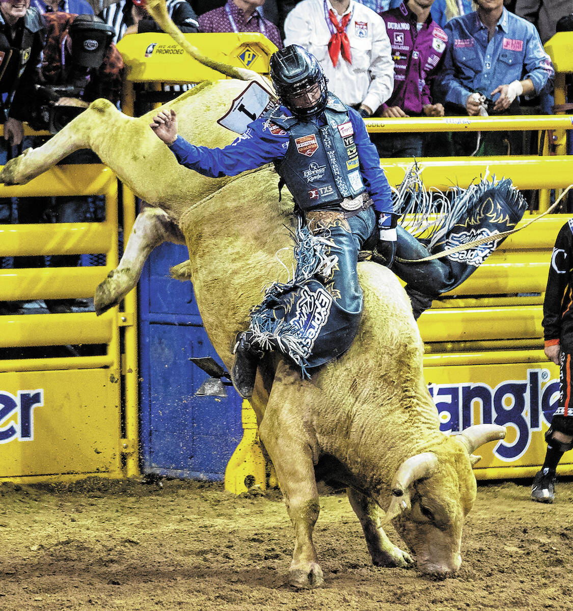 Parker Breding of Edgar, Mont., rides Zombie Time in Bull Riding during the sixth round of the ...