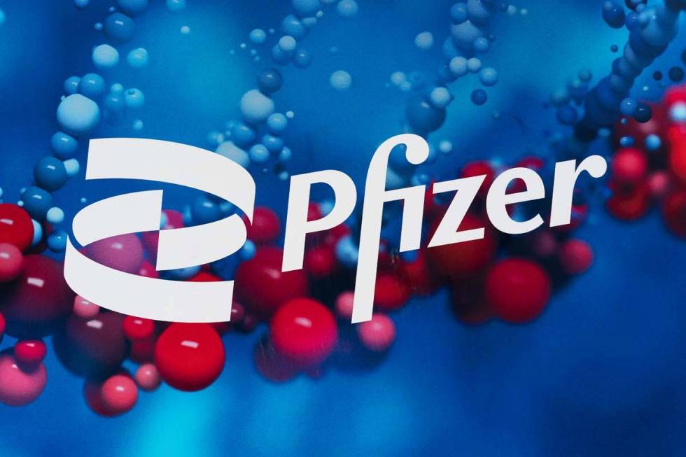 The Pfizer logo is displayed at the company's headquarters in New York, Feb. 5, 2021. Pfizer sa ...