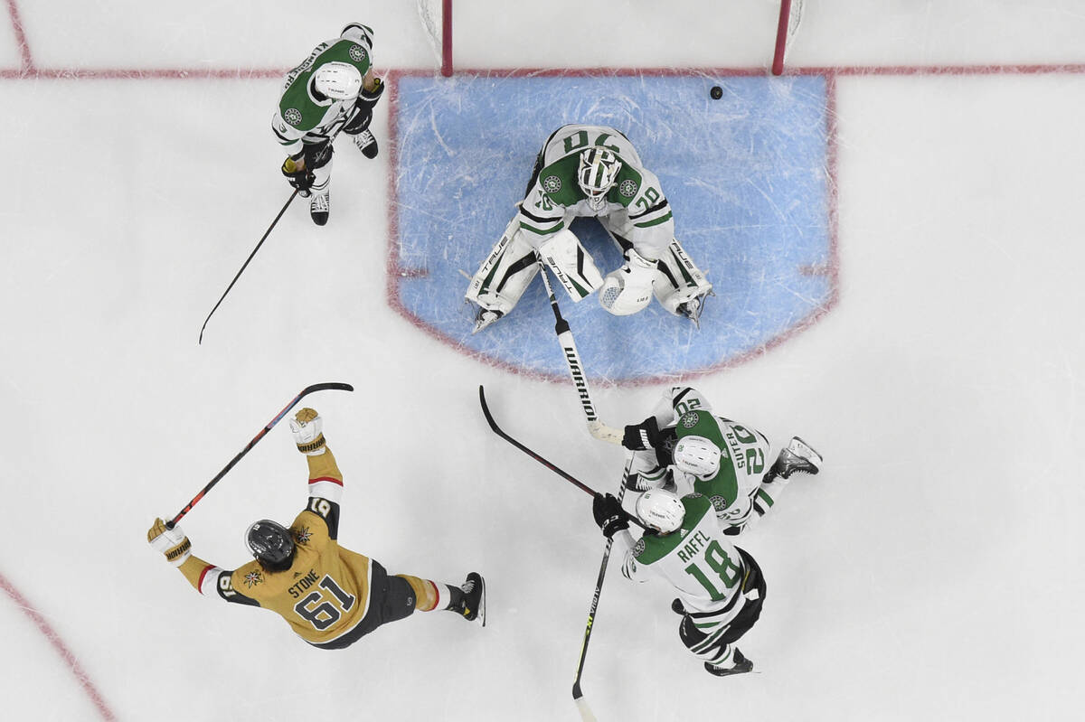 Vegas Golden Knights right wing Mark Stone (61) reacts after scoring against Dallas Stars goalt ...
