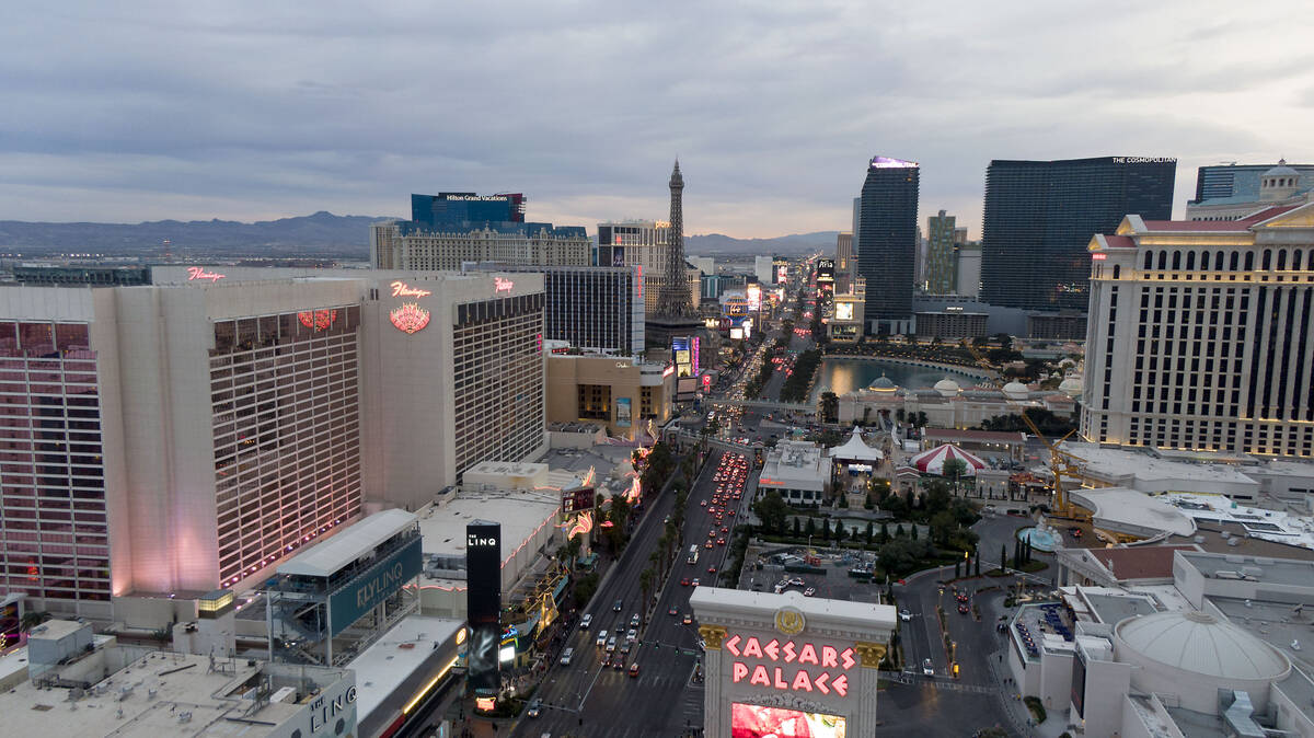 Aerial view looking south down the Las Vegas Strip at sunset on Monday, December 6, 2021. (Mich ...