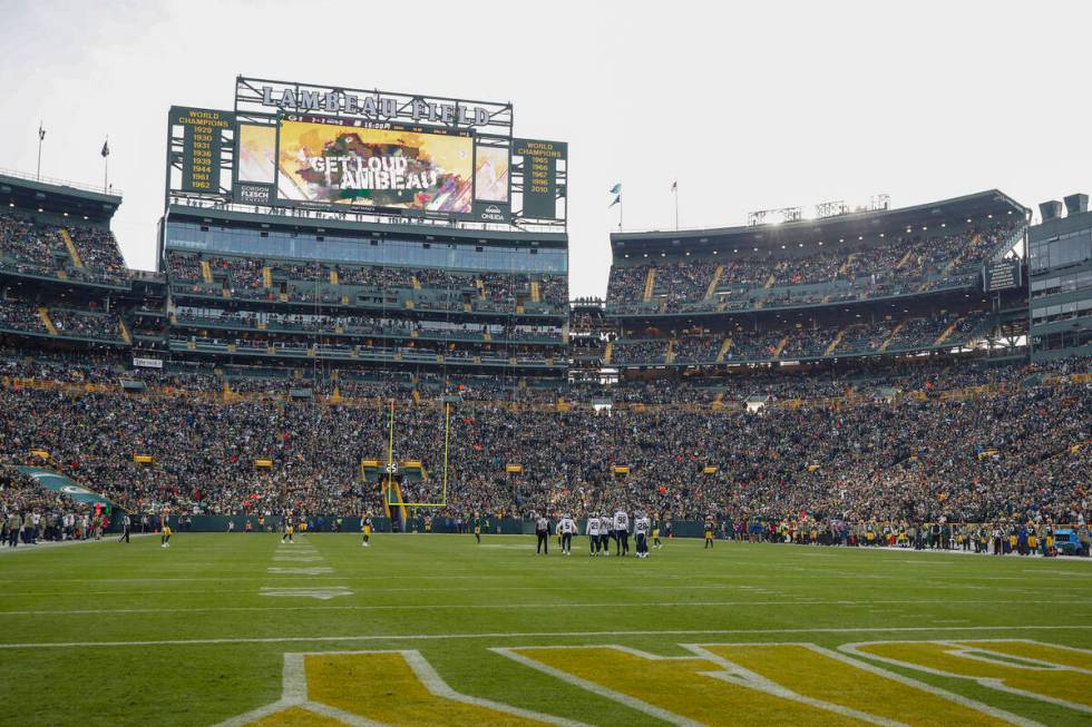 Snow is seen at Lambeau Field before an NFL football game between the Green Bay Packers and the ...