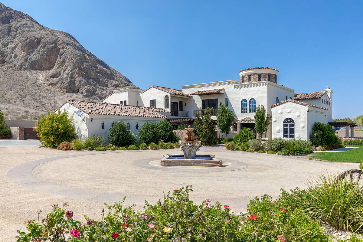 A Lone Mountain estate dubbed “The House of Roses” has hit the market for $7.95 million. Th ...