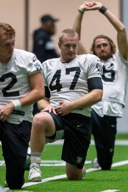 Raiders long snapper Trent Sieg (47) stretches during practice at Raiders headquarters at the I ...