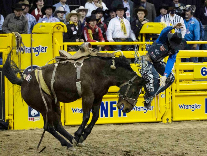 Stetson Wright of Milford, Utah, thrown from Diamond Fever in Saddle Bronc Riding during the fo ...