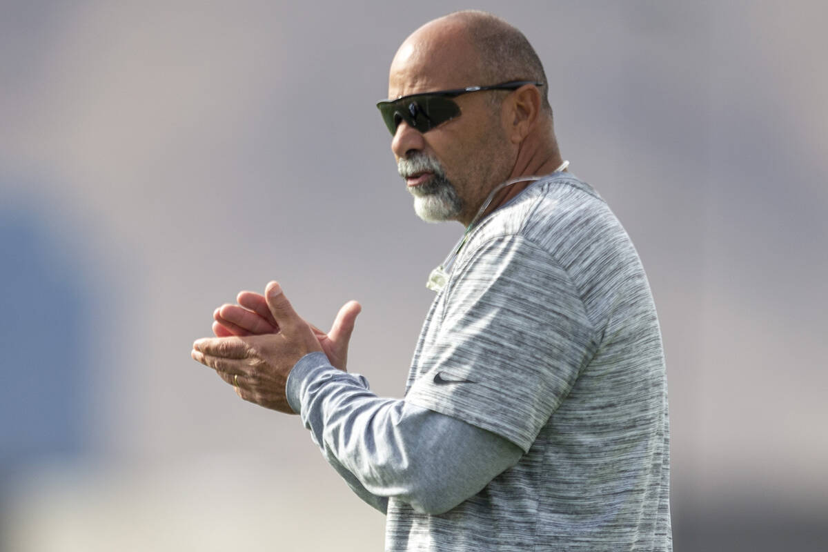 Raiders interim head coach Rich Bisaccia claps during a practice session at Raiders headquarter ...