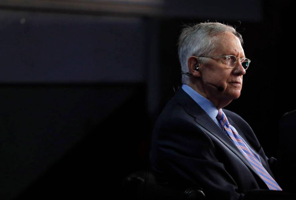 Sen. Harry Reid is interviewed during the final day of the Democratic National Convention in Ph ...