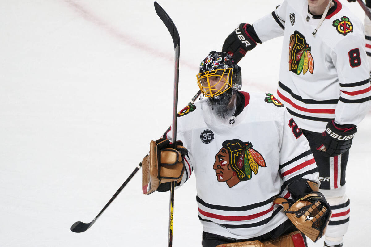 Chicago Blackhawks goaltender Marc-Andre Fleury salutes the crowd after recording his 500th car ...