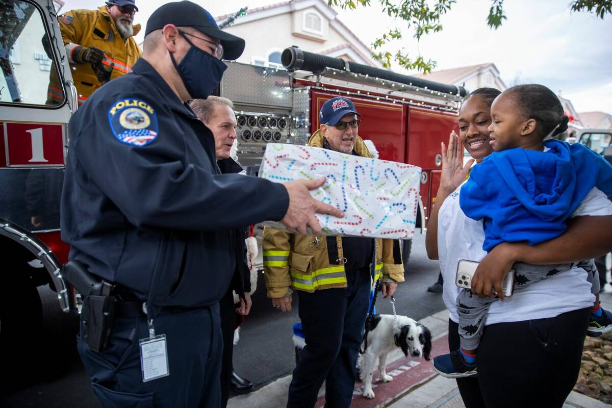 (From right) Aayden Hobbs, 3, a heart transplant recipient, and his mother Dshyra Hobbs are pre ...