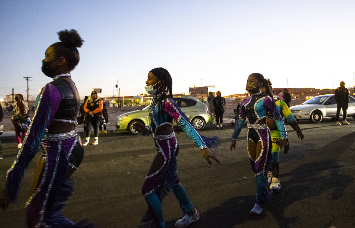 Members of the Priceless Diamonds dance group perform during a community event in the Historic ...