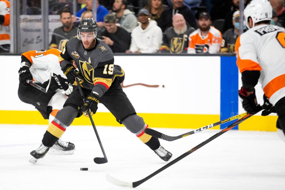 Golden Knights right wing Reilly Smith (19) skates with the puck as Flyers center Max Willman ( ...