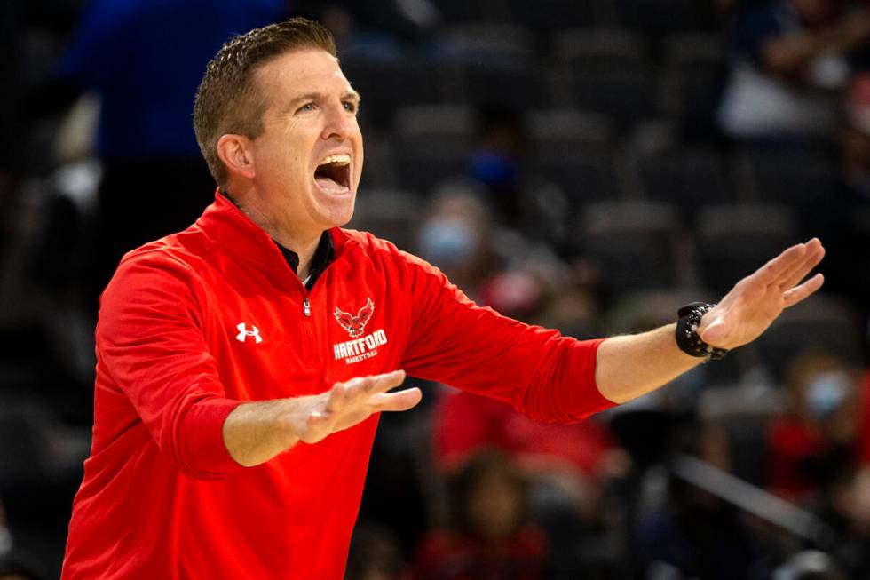 Hartford Hawks head coach John Gallagher shouts from the sidelines during the first half of an ...