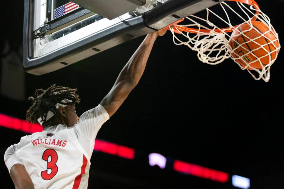 UNLV Rebels forward Donovan Williams (3) dunks during the first half of an NCAA mens college ba ...