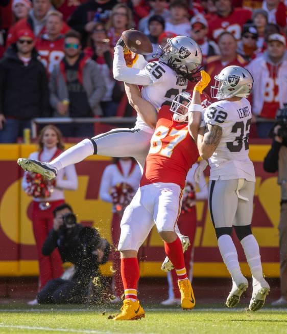 Raiders free safety Trevon Moehrig (25) breaks up a pass and nearly intercepts Kansas City Chie ...
