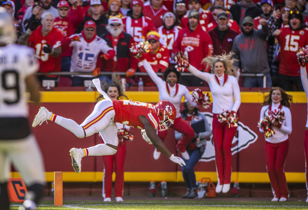 Kansas City Chiefs running back Darrel Williams (31) dives over the goal line for another score ...