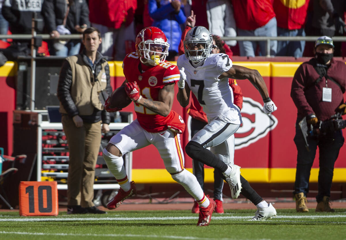 Kansas City Chiefs cornerback Mike Hughes (21) heads to the end zone for a touchdown after reco ...