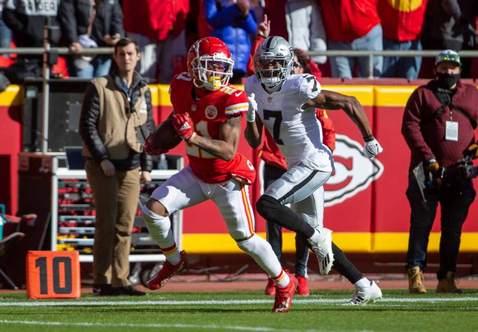 Kansas City Chiefs cornerback Mike Hughes (21) heads to the end zone for a touchdown after reco ...