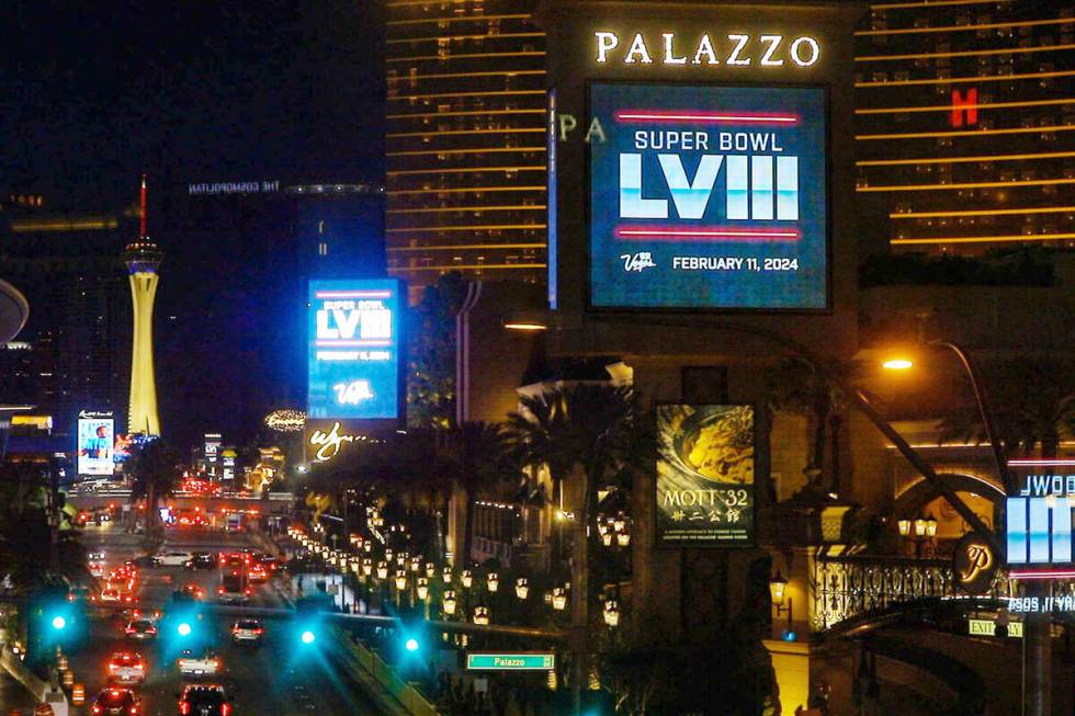 Marquees along the Strip show the announcement that Super Bowl III will be held in Las Vegas on ...