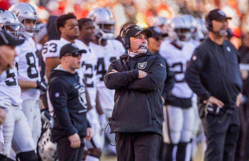 Raiders interim head coach Rich Bisaccia looks on as the Kansas City Chiefs score again late du ...