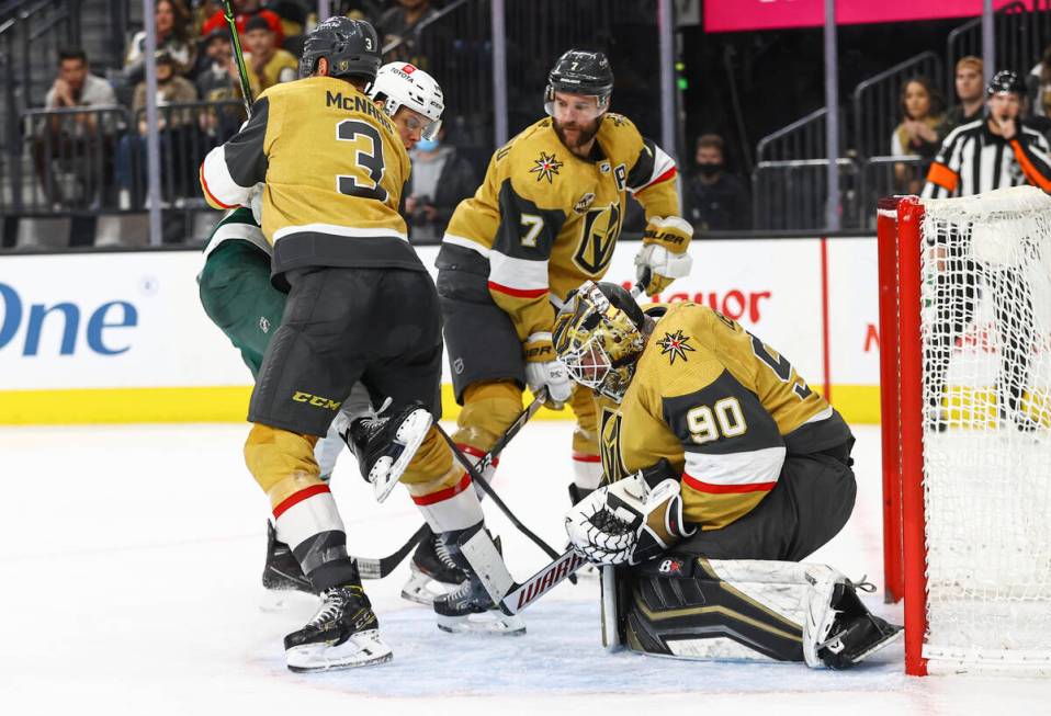 Golden Knights goaltender Robin Lehner (90) makes a save against the Minnesota Wild during the ...