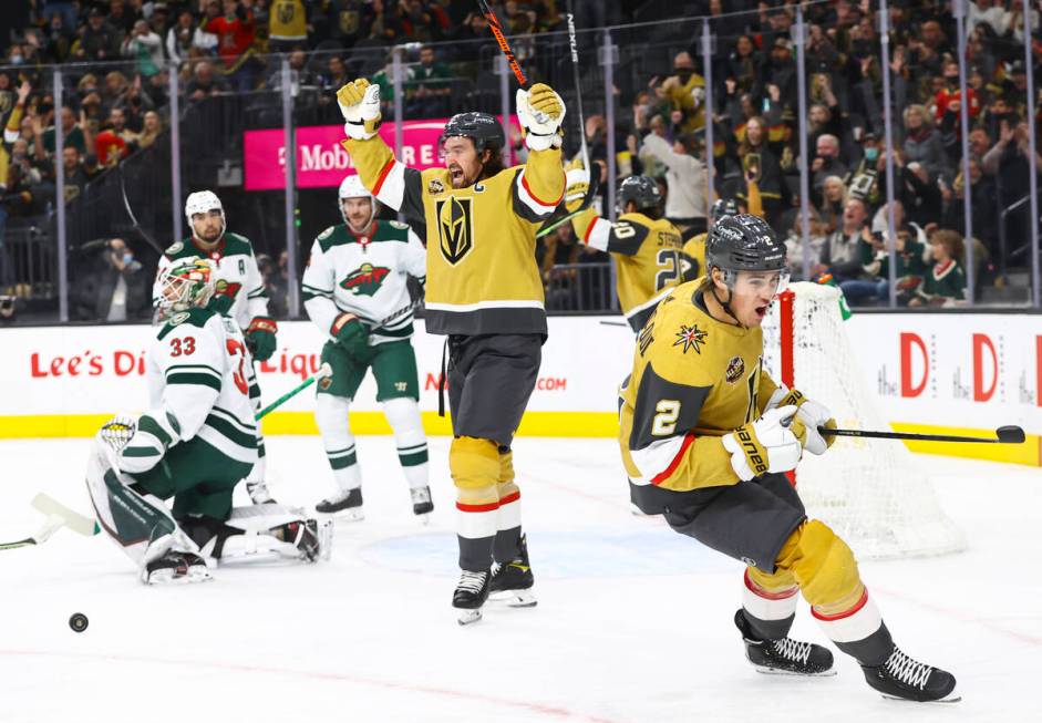 Golden Knights defenseman Zach Whitecloud (2) celebrates after his goal past Minnesota Wild goa ...