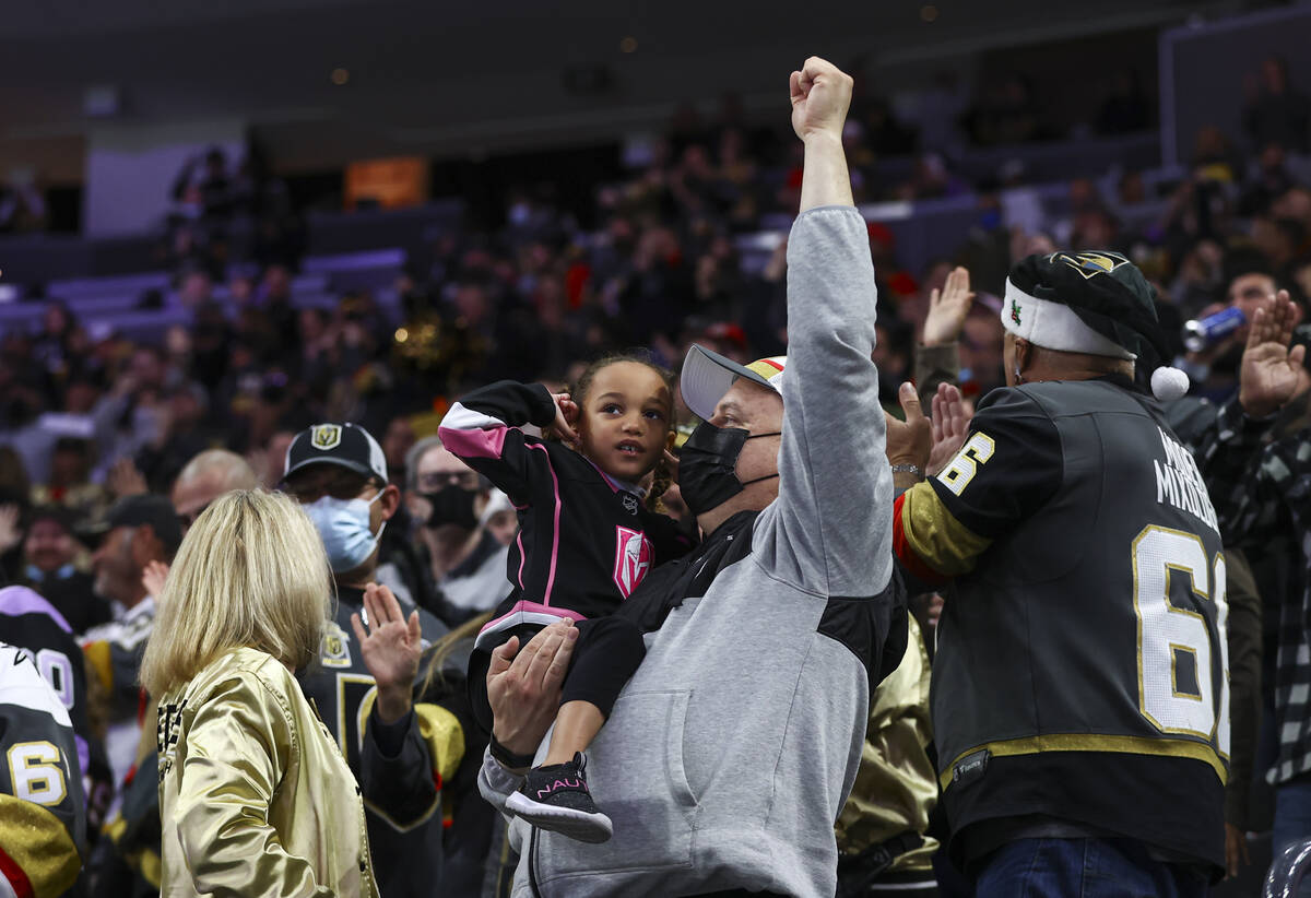 Golden Knights fans celebrate after a goal by right wing Mark Stone, not pictured, during the t ...