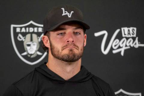 Raiders quarterback Derek Carr takes media questions during the postgame news conference after ...