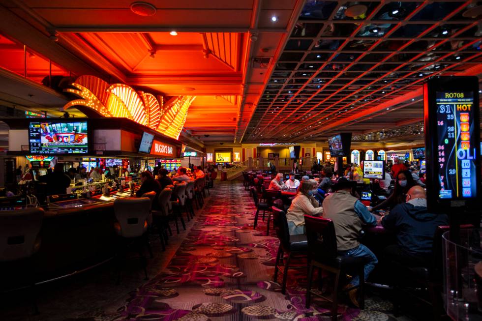 BugsyÕs Bar, left, is pictured near table games at the Flamingo in Las Vegas on Wednesday, ...