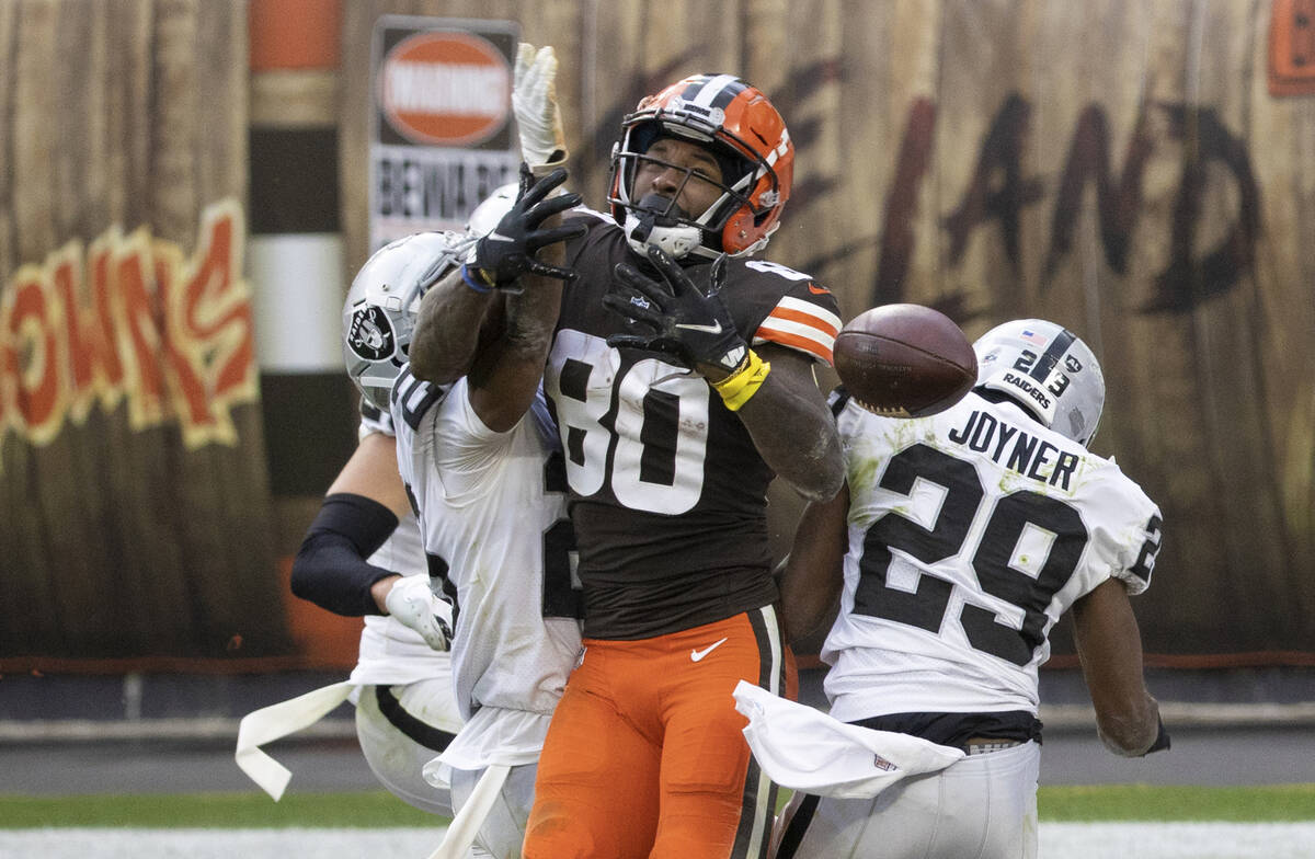 Cleveland Browns wide receiver Jarvis Landry (80) drops a pass with Las Vegas Raiders free safe ...