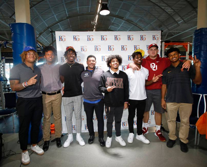 Bishop Gorman High School football players Jeremiah-Joseph 'JJ' Bwire, from left, Benjamin Huds ...