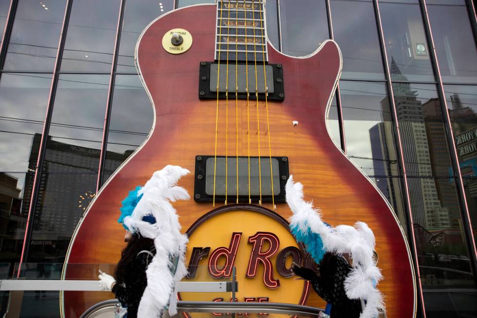 An enormous guitar adorns the outside of a Hard Rock Cafe on Thursday, Dec. 16, 2021, on the La ...