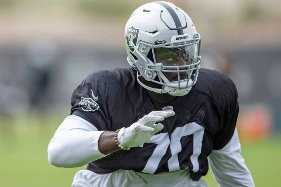 Raiders offensive tackle Alex Leatherwood (70) drills during a practice session at the Raiders ...