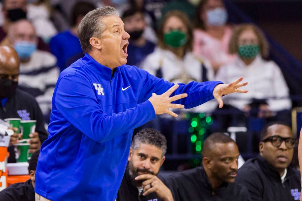 Kentucky head coach John Calipari yells to his players during an NCAA college basketball game a ...
