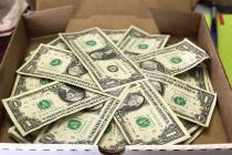 Special delivery! Serve up some real dough by overlapping dollar bills into the shape of a circ ...