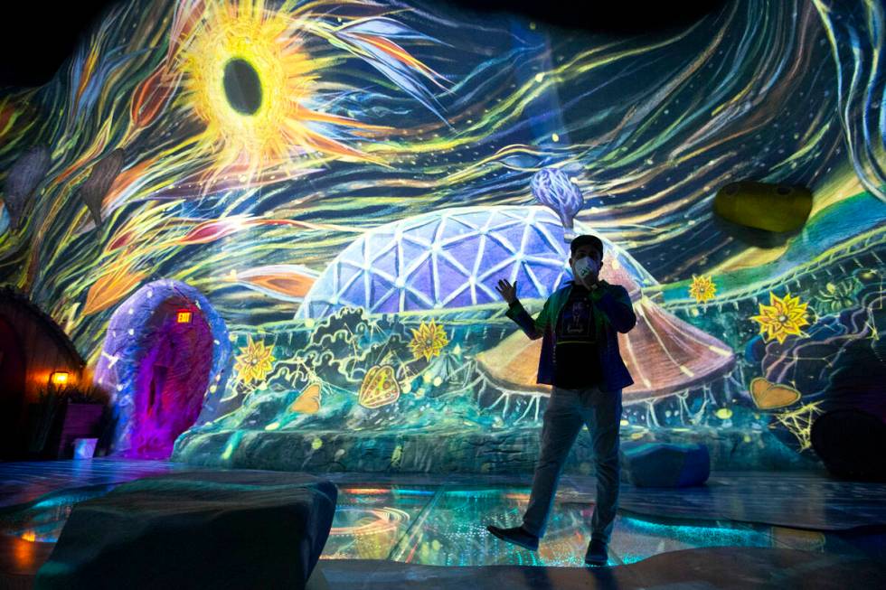 Corvas Brinkerhoff, executive creative director of Meow Wolf Las Vegas, explains a projected de ...