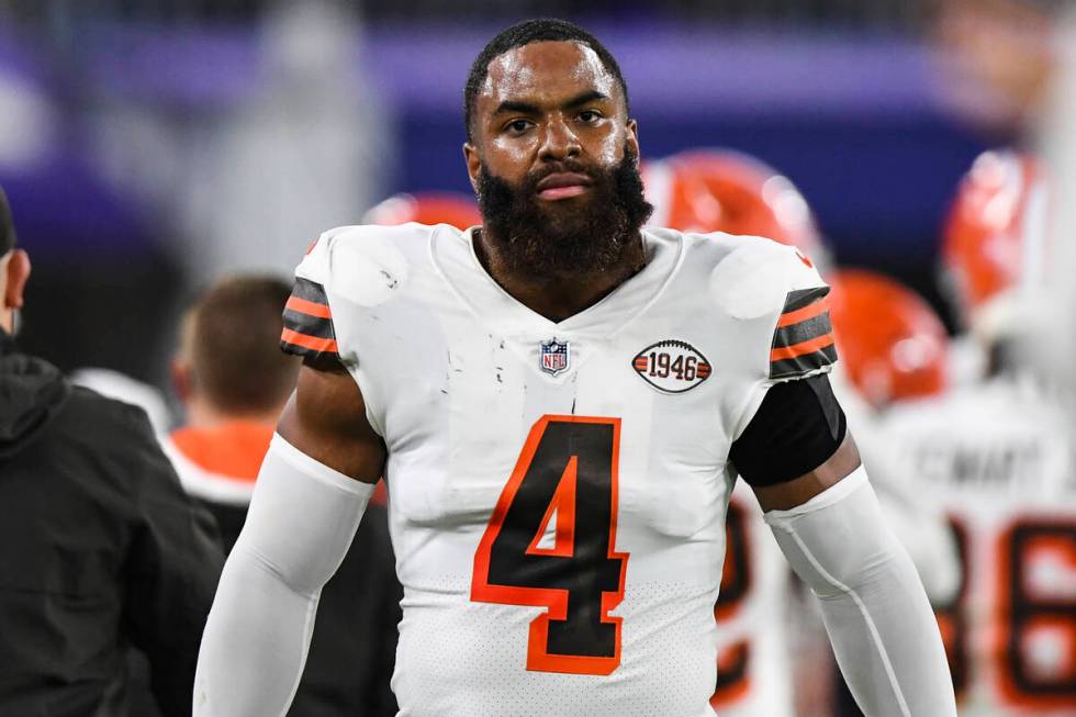 Cleveland Browns linebacker Anthony Walker (4) looks on from the sideline during the first half ...