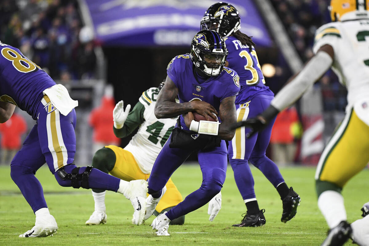 Baltimore Ravens quarterback Tyler Huntley (2) runs the ball during the second quarter of an NF ...