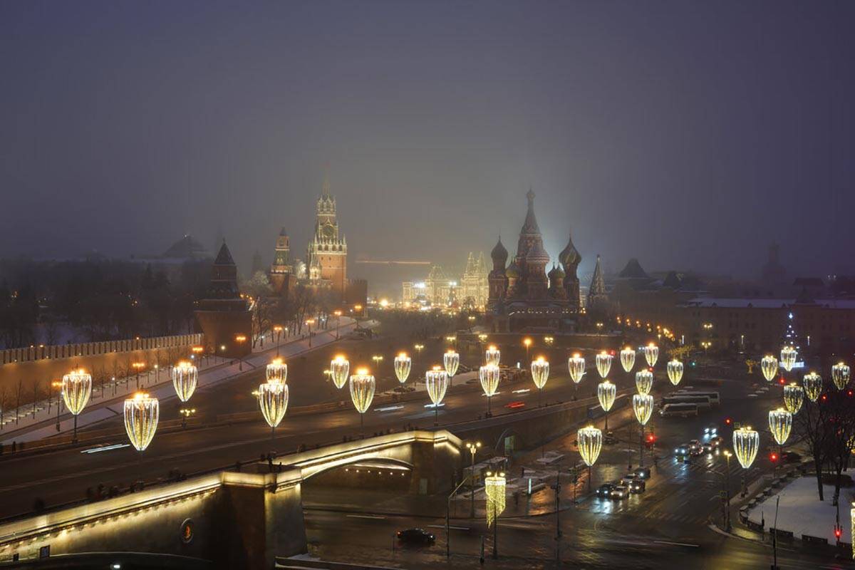 The Kremlin Wall, the Spasskaya Tower, Red Square, the GUM department store, the St. Basil's Ca ...