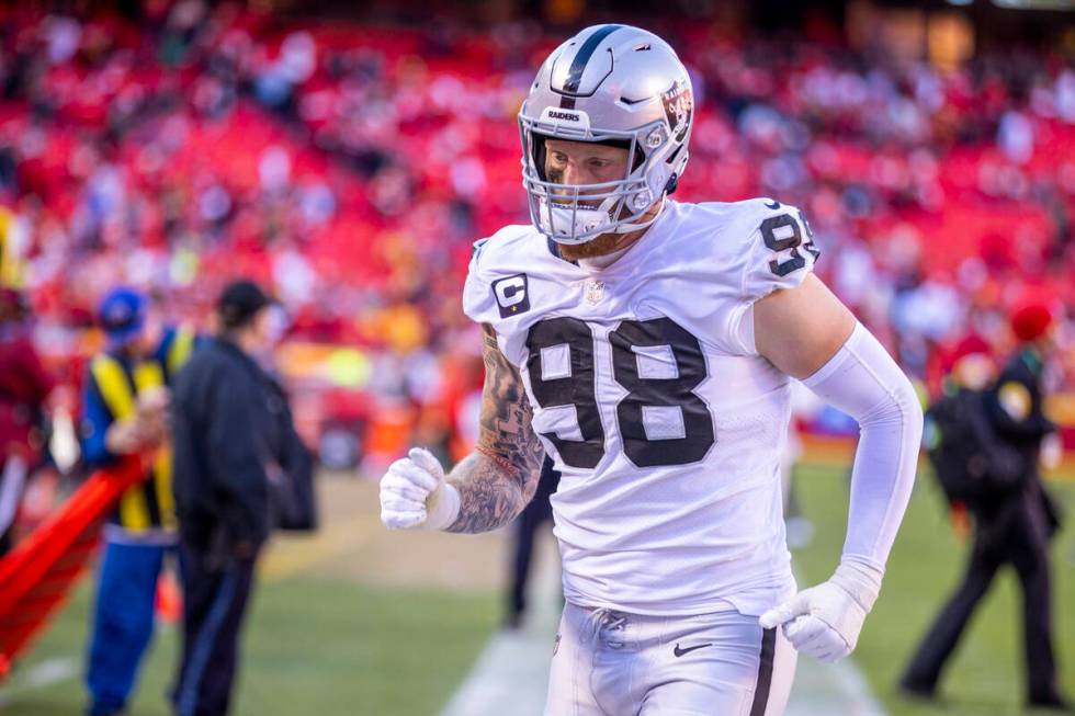 Raiders defensive end Maxx Crosby (98) jogs off the field after losing to the Kansas City Chief ...