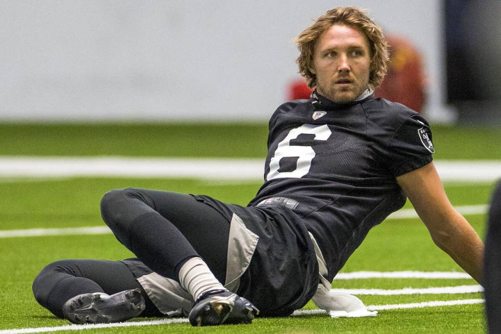 Las Vegas Raiders punter AJ Cole (6) stretches with teammates during warm ups at the Intermount ...