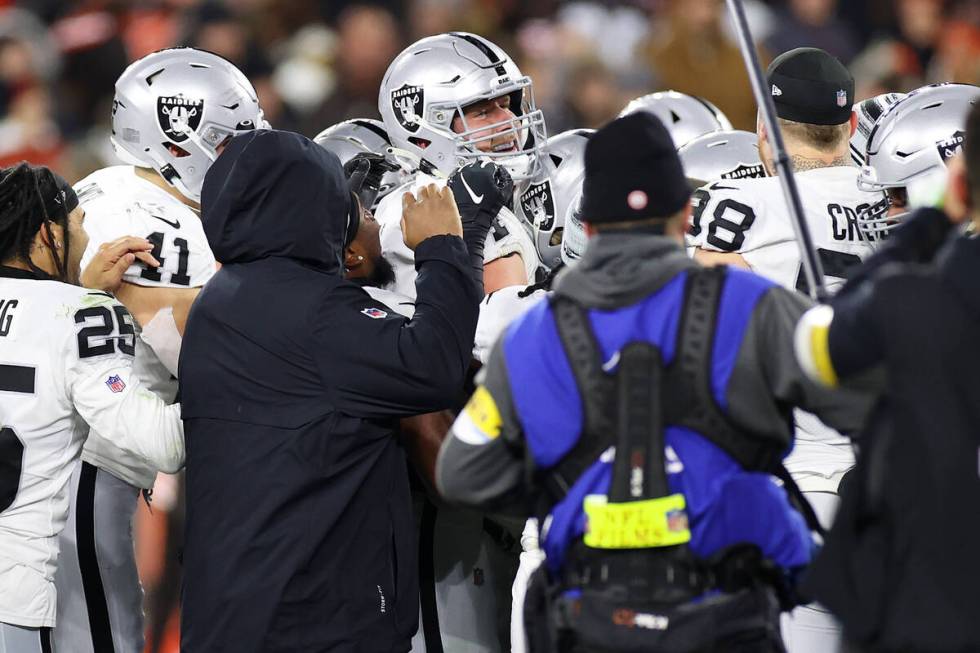 Raiders celebrate a game wining field goal by kicker Daniel Carlson (2) during the second half ...