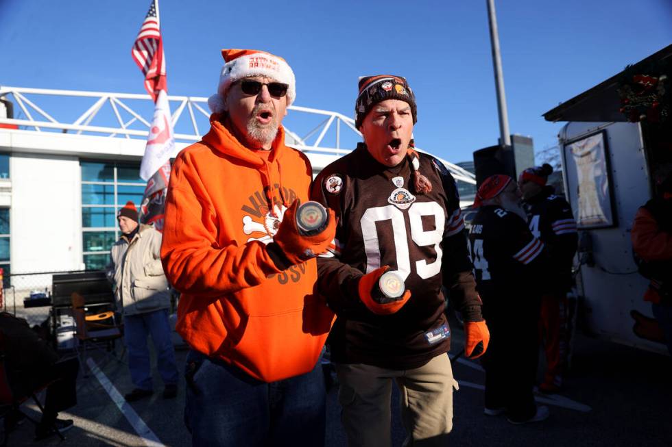 Ralph Nazario, left, and Jay Negin, tailgate before an NFL football game between the Raiders an ...