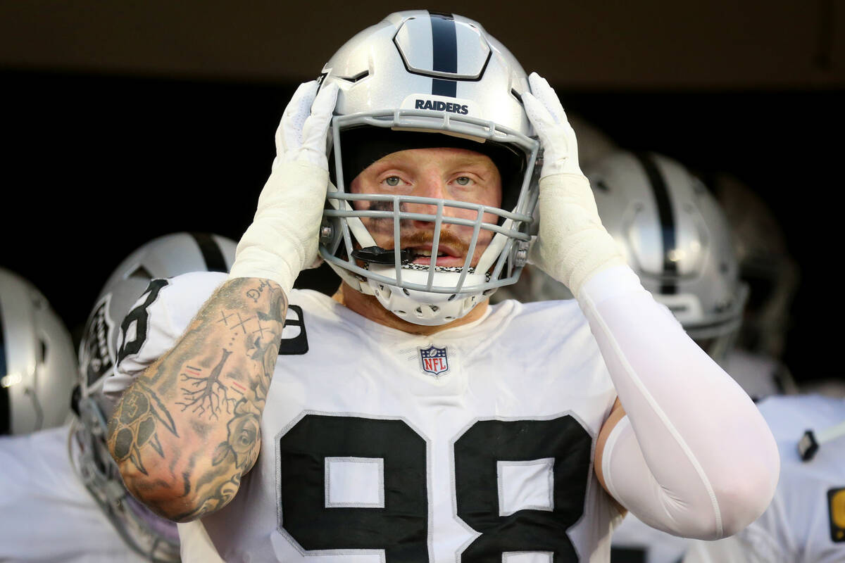 Raiders defensive end Maxx Crosby (98) gets ready to take the field with his team for the start ...