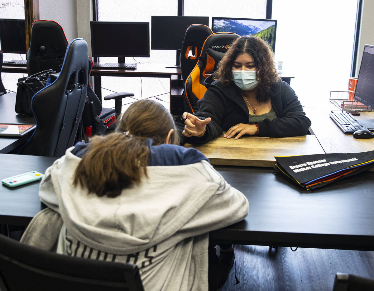 Miriam Gomez, right, a program manager at Leader in Training, a first-generation college readin ...