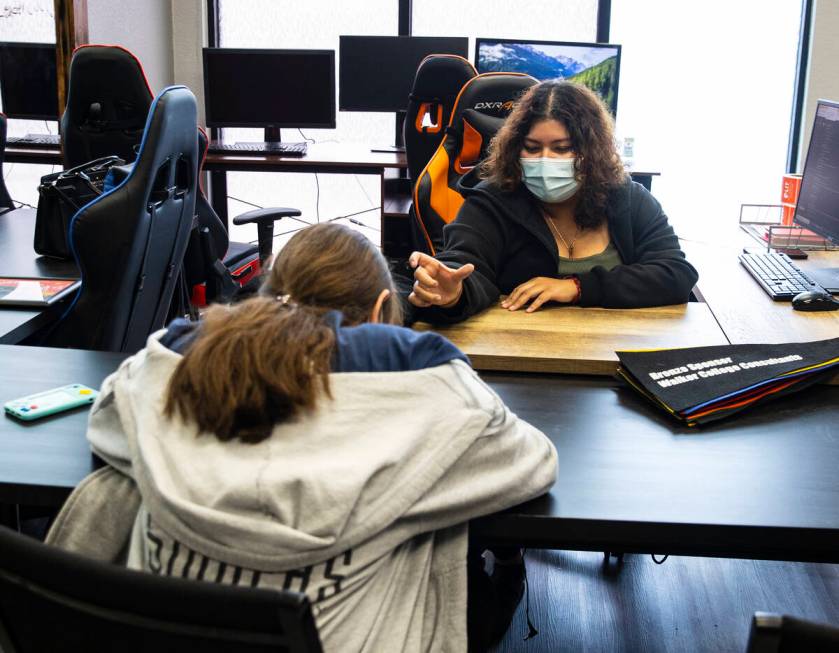 Miriam Gomez, right, a program manager at Leader in Training, a first-generation college readin ...